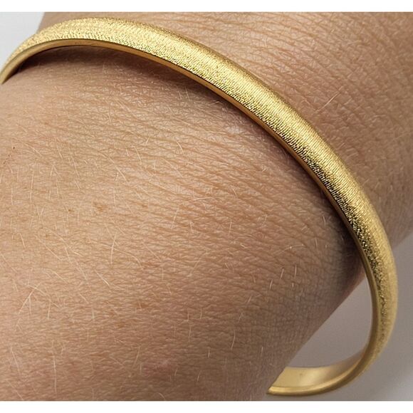 Monet Etched Goldtone Bangle Bracelet 7.5in - Picture 1 of 3